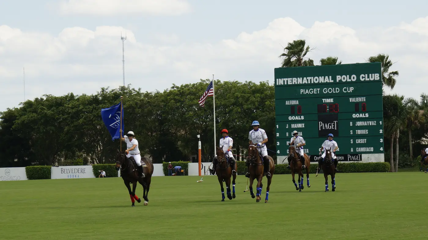 Polo players competing on a representative Florida polo field