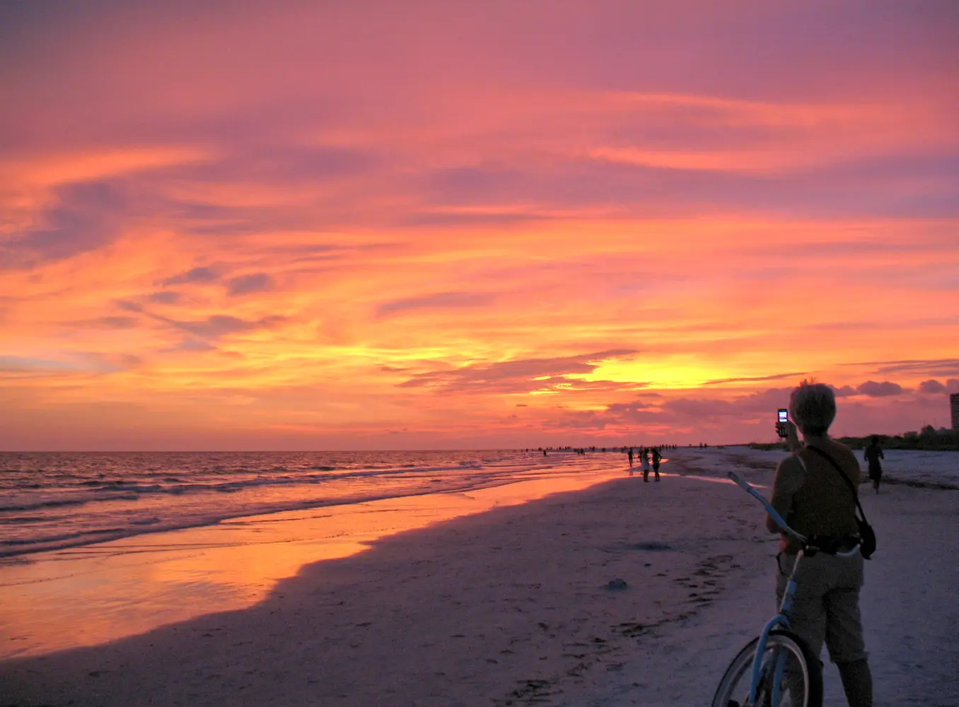 Warm sunset colors over a Siesta Key shoreline