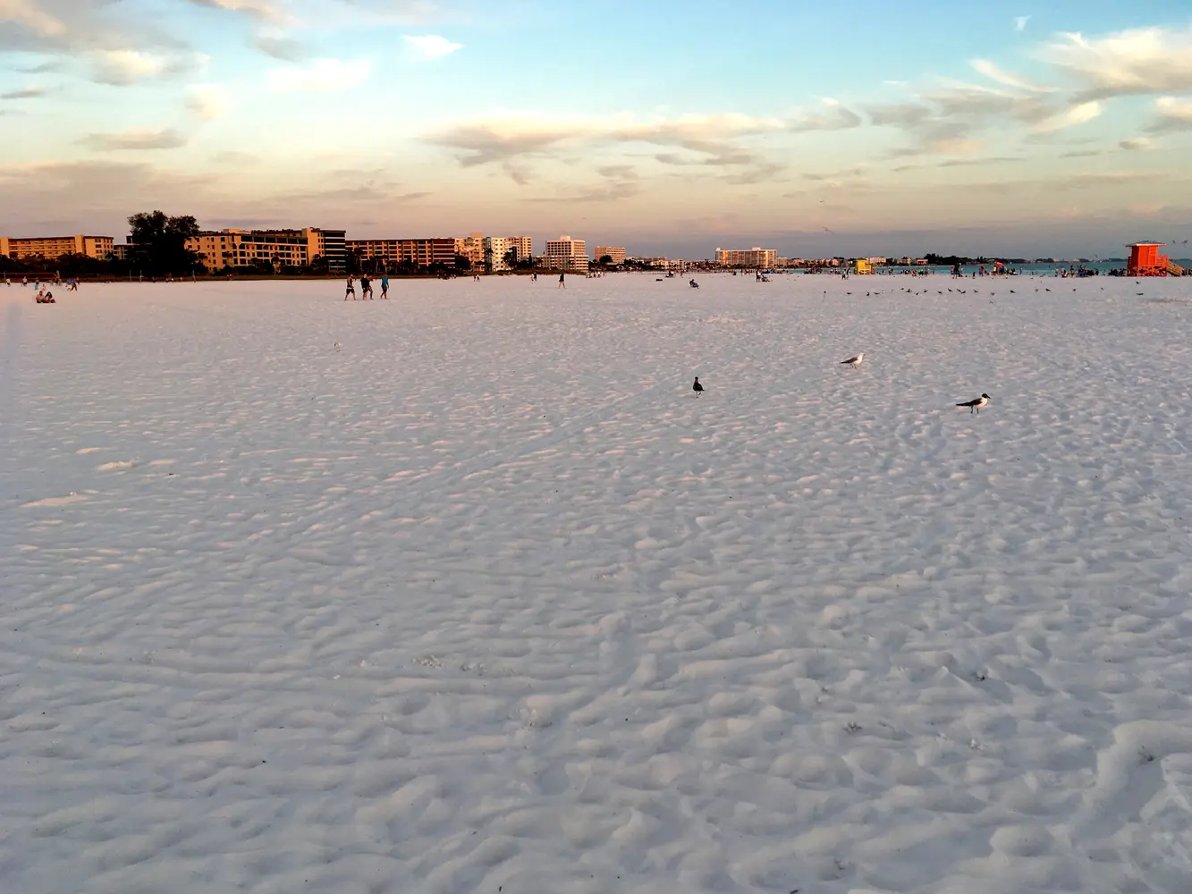 Expansive sunset view across Siesta Beach