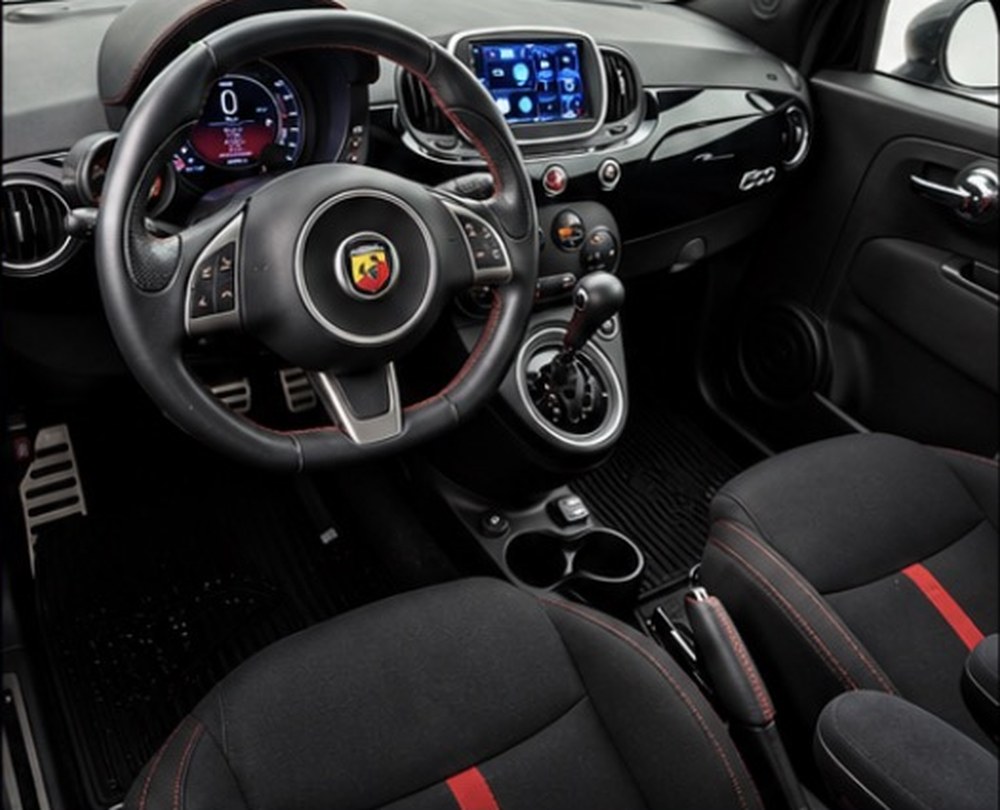 Fiat 500 Abarth dashboard, steering wheel and five-speed shifter